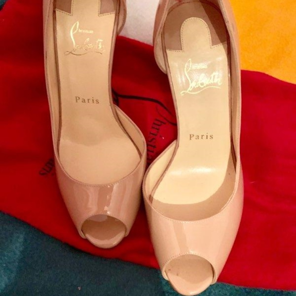 Authentic!! Christian Louboutin like knew.